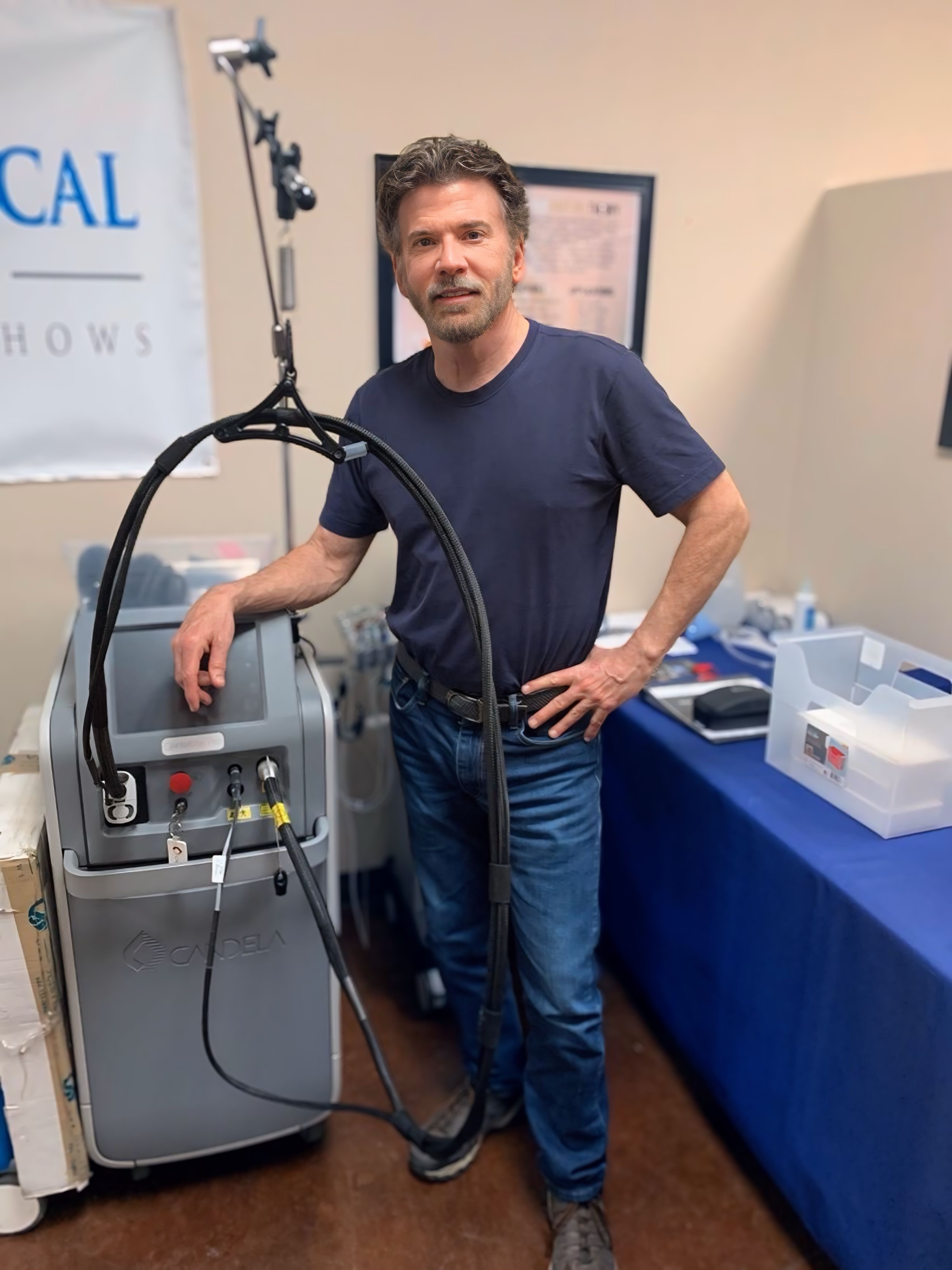 Don Berryhill conducting hands-on laser training session with aesthetic professionals in clinical setting